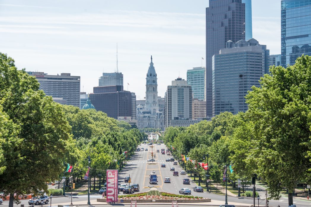 Philadelphia city hall in the background from the vantage point of the benjamin franklin parkway