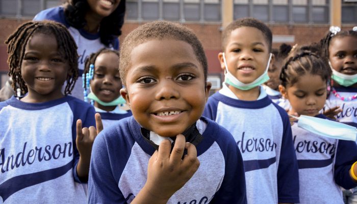 Before class, kids at Add B. Anderson stop for a selfie!