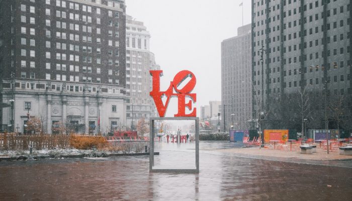 Philadelphia's LOVE sculpture in Winter, with the Benjamin Franklin Parkway in the background