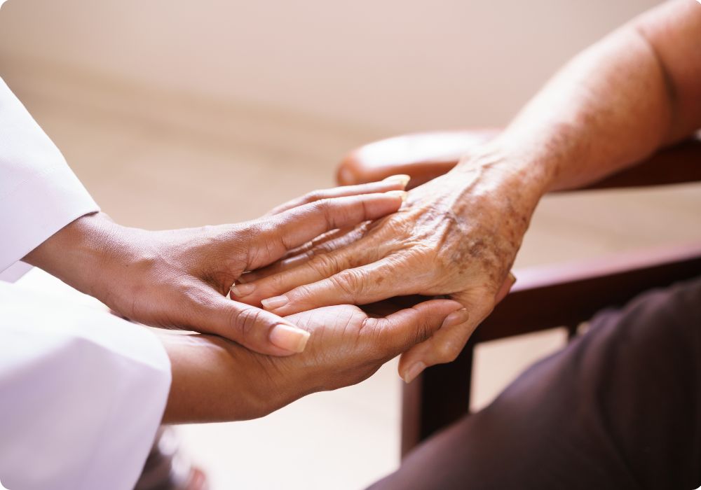 Elder people holding hands