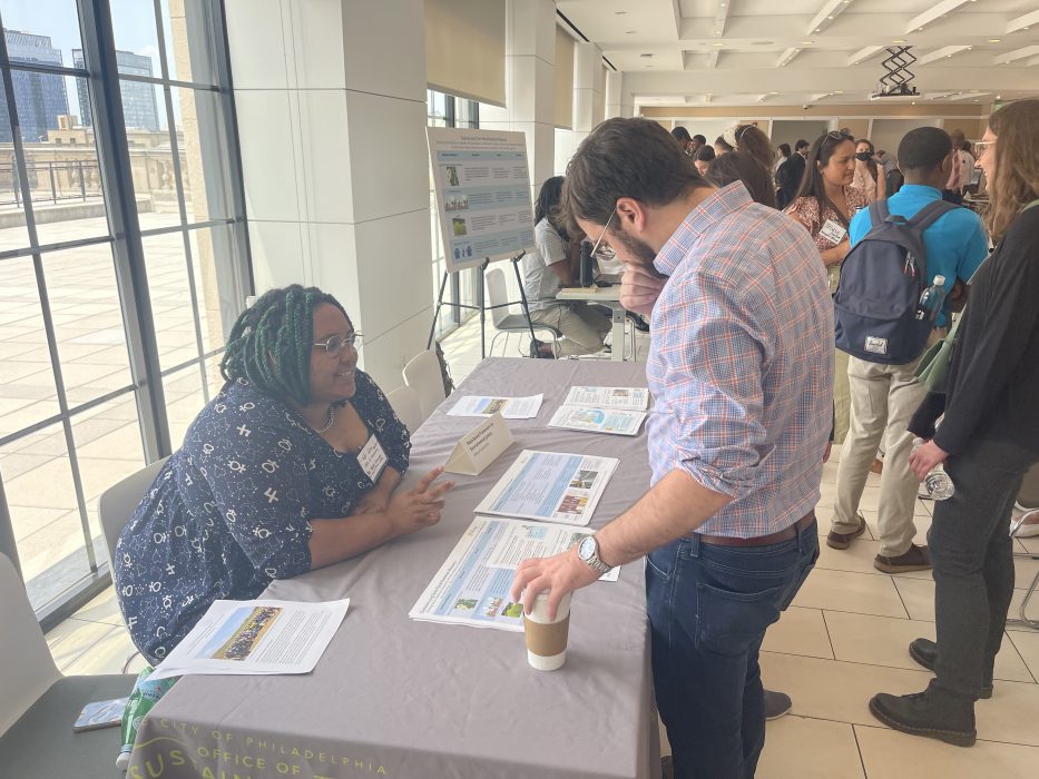 Project teams explain materials to guest at the OTF Showcase