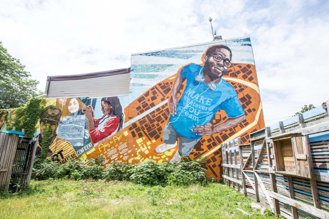 Mural in Philadelphia with boy with hands on hips