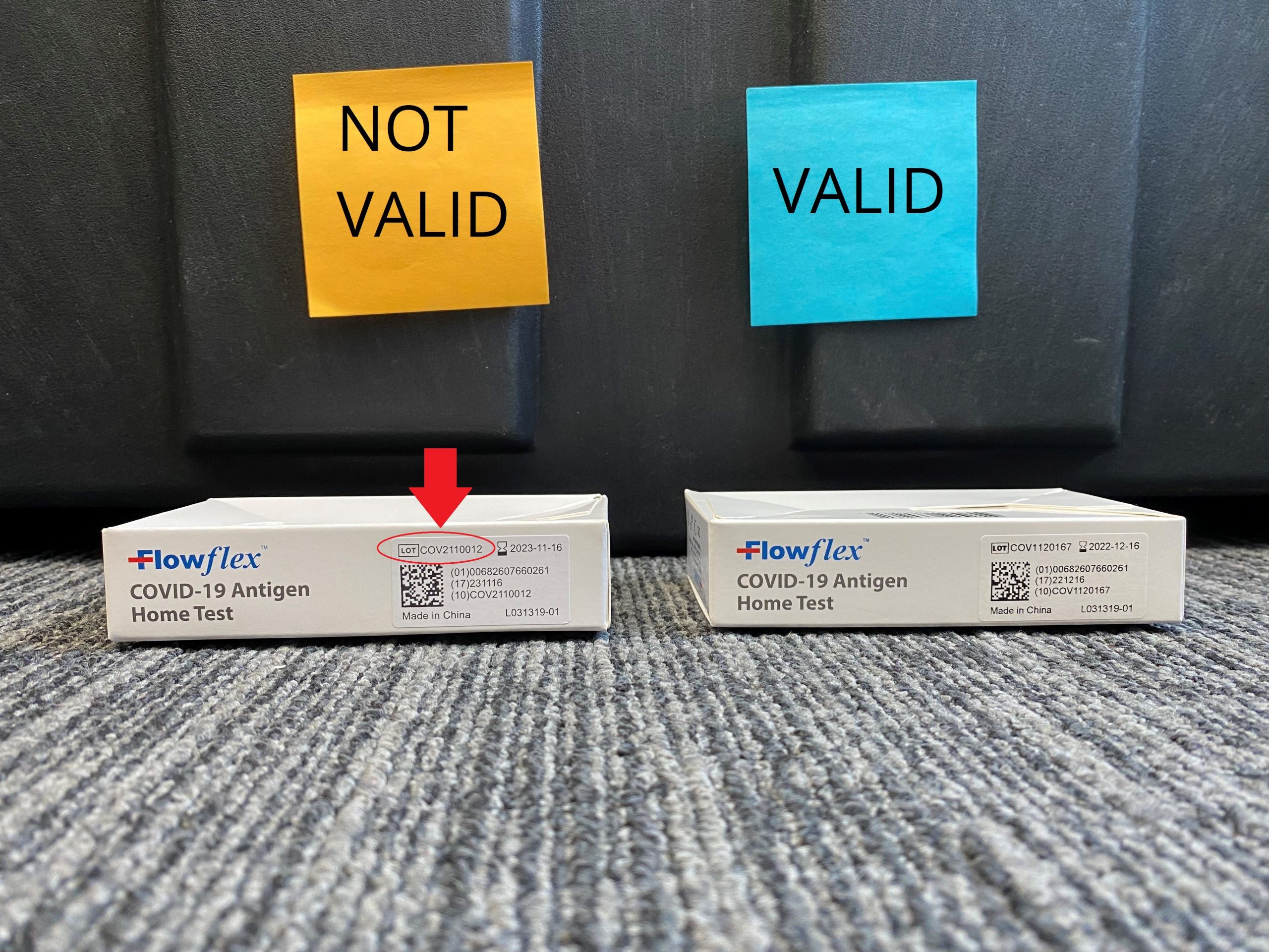 Two COVID-19 test kits, one labeled as Valid and the other labeled as Not Valid. The Not Valid testing kit has the Lot Number circled and highlighted with an arrow.