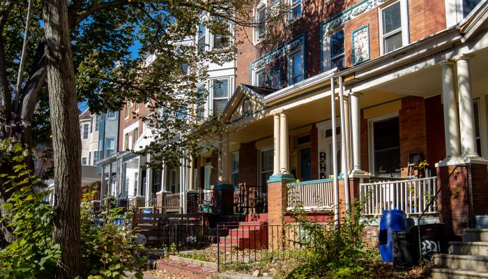 brick façade homes in West Philadelphia on a sunny day