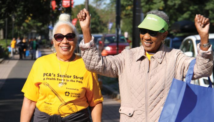 Two older adults take part in PCA's Senior Strut