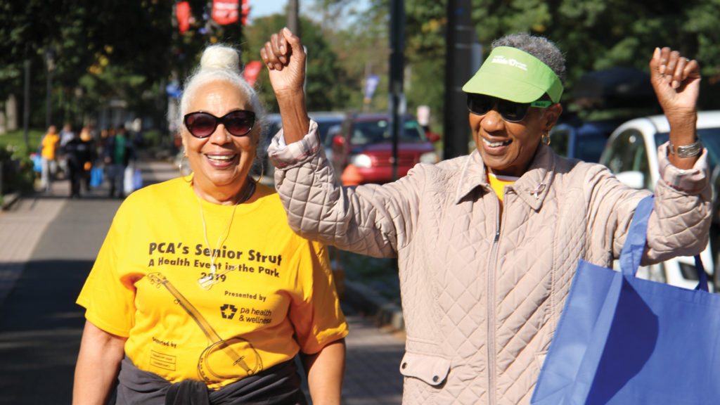 Two older adults take part in PCA's Senior Strut