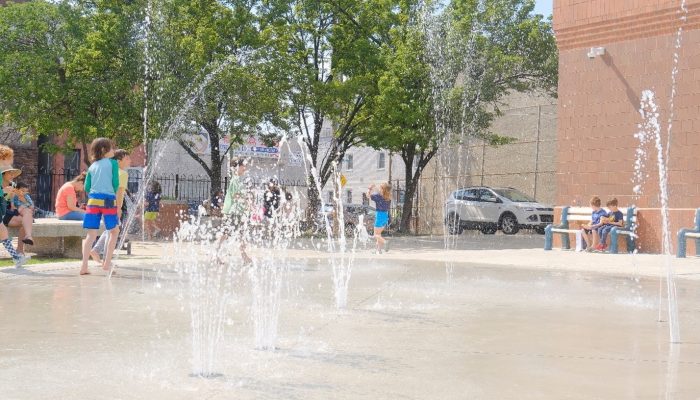 Children play at the sprayground at East Passyunk Community Center in South Philadelphia. 