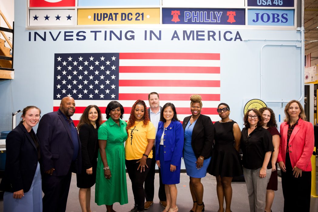 Mayor Cherelle L. Parker standing with government members, including Acting Secretary of Labor, Julie Su and White House Domestic Policy Advisor, Neera Tanden