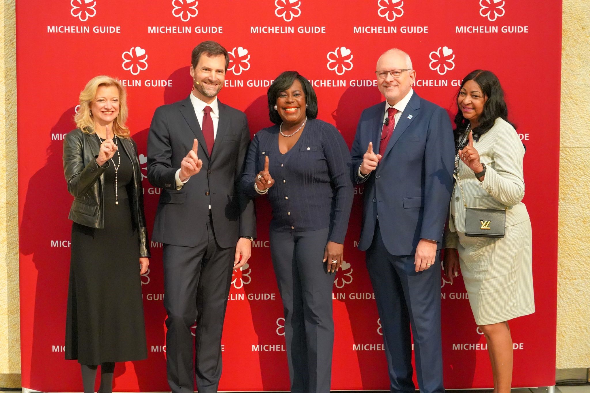 International Director of the Michelin Guide, Gwendal Poullennec, poses for a picture with Mayor Cherelle Parker, President & CEO of the Philadelphia Convention and Visitors Bureau Gregg Caren, and City Representative Jazelle Jones.
