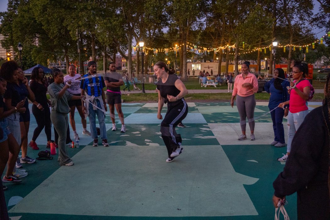 Young people gather to jump rope at the Oval.