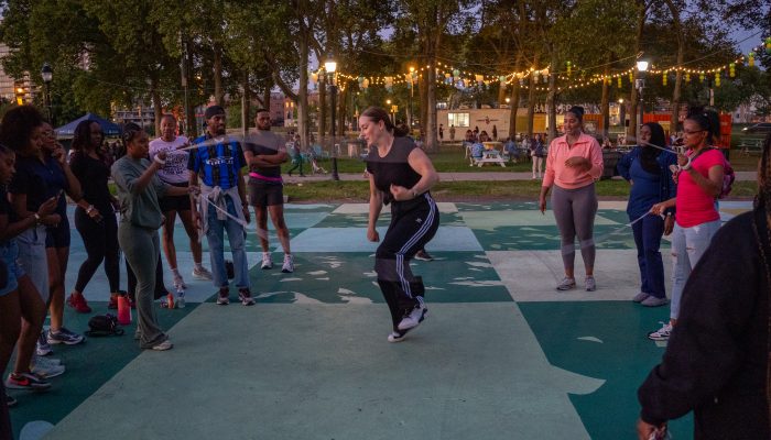 Young people gather to jump rope at the Oval.