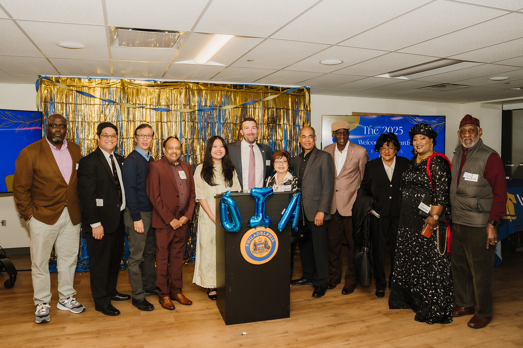 Welcoming Awards Group Photo of members of the Mayor's Commission on African and Caribbean Immigrant Affairs and Mayor's Commission on Asian and Pacific American Affairs.