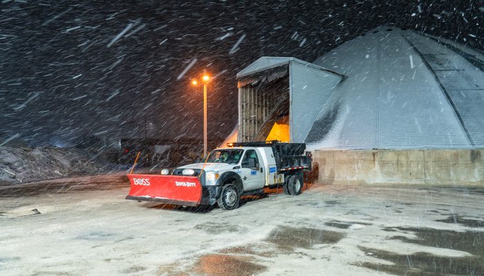 Snow Plow in front of salt dome in Philadelphia during the snow.