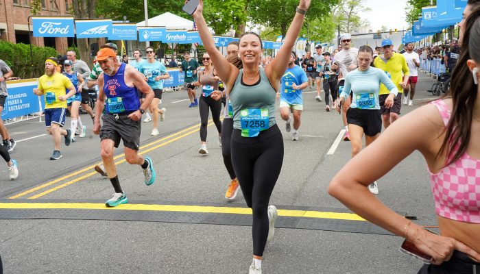 Runners cross the finish line of the 2025 Broad Street Run.