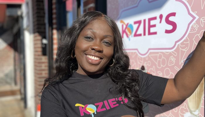 Akosua Opoku standing in front of her business Kozie’s Water Ice in Northwest Philadelphia