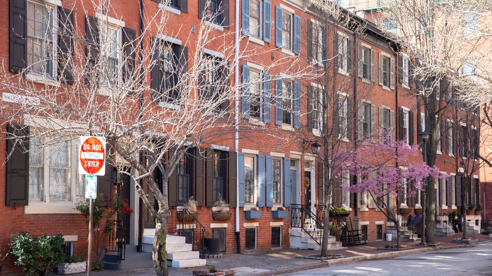 Rowhouses with a Do Not Enter sign in front