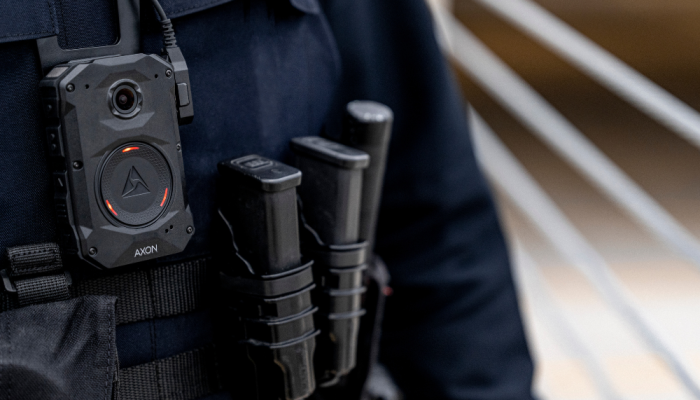 Body-worn camera fitted on police officer.