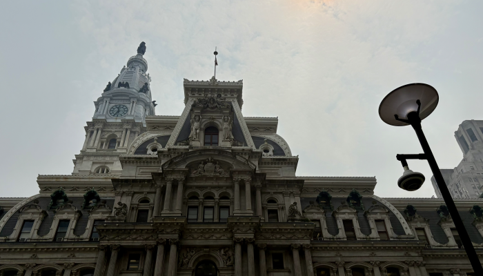 Philadelphia City Hall under a red sun caused by wildfire smoke