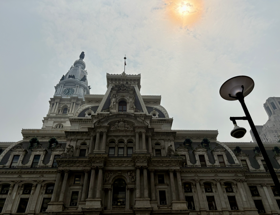 Philadelphia City Hall under a red sun caused by wildfire smoke