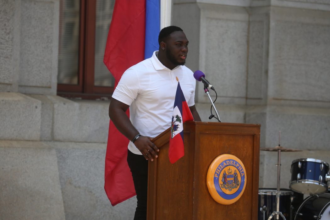 Performer at City Hall Haitian Flag Day ceremony.