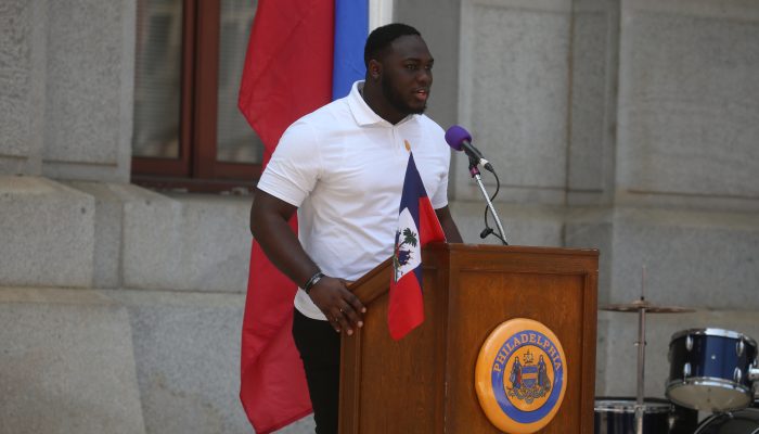 Performer at City Hall Haitian Flag Day ceremony.
