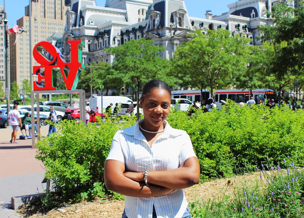 Tayja poses for headshot in Love Park