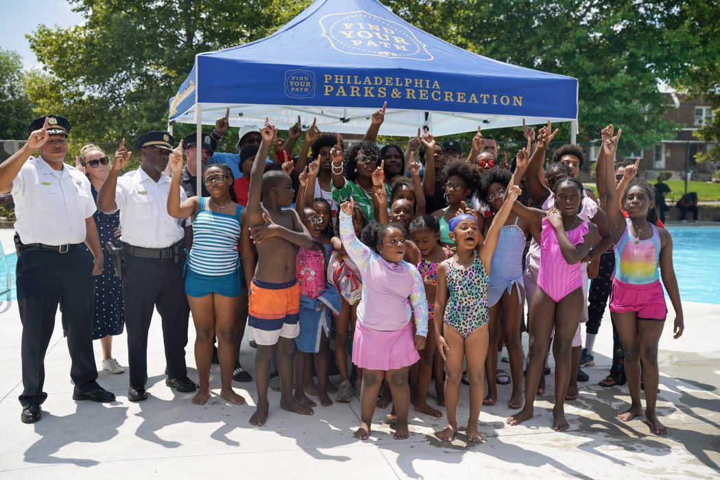 Mayor Cherelle Parker poses with young children and city officials during Life Guard Appreciation day.