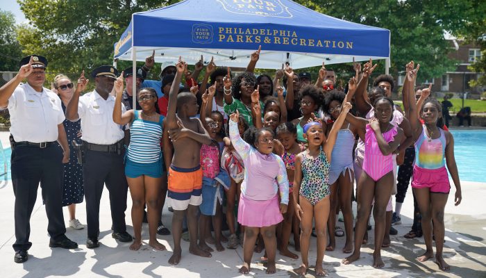 Mayor Cherelle Parker poses with young children and city officials during Life Guard Appreciation day.