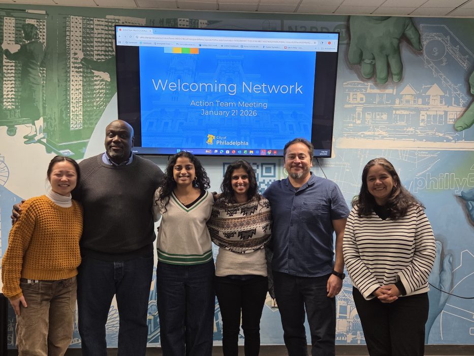 Office of Immigrant Affairs staff and Welcoming Network steering committee members after a meeting.