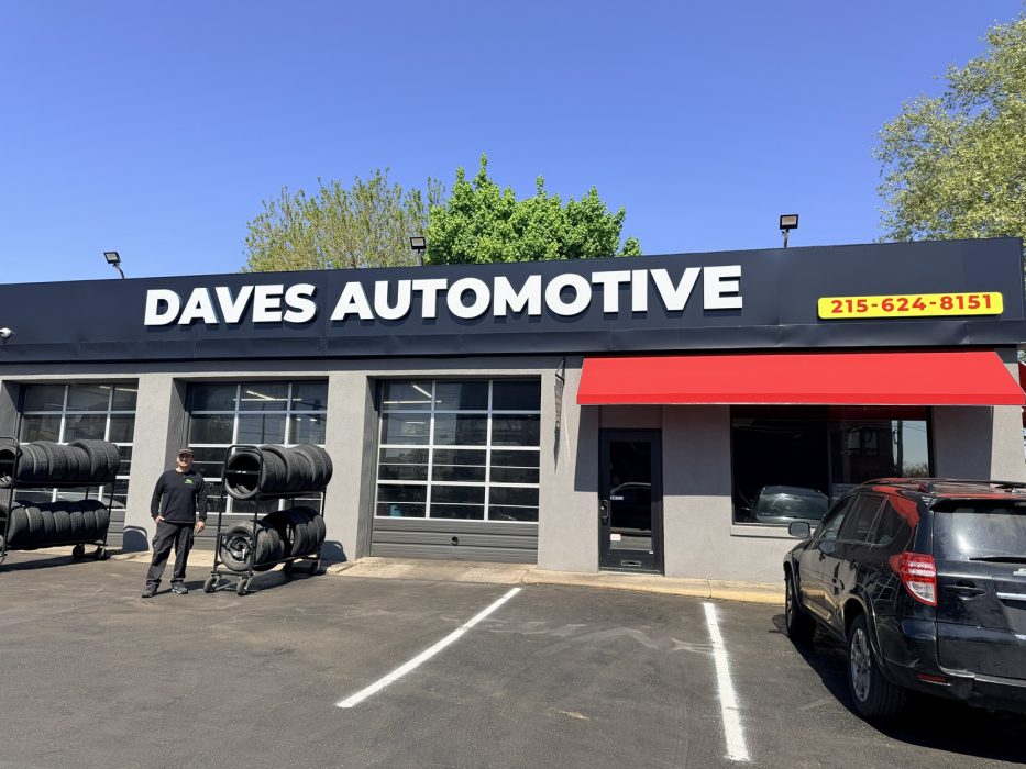 Richard Sanchez stands in front of Dave's Automotive in Tacony.